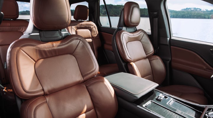 The front row's Perfect Position Seats in a 2024 Lincoln Aviator® Reserve model with Ebony Roast interior | Allan Vigil Lincoln, Inc. in Morrow GA