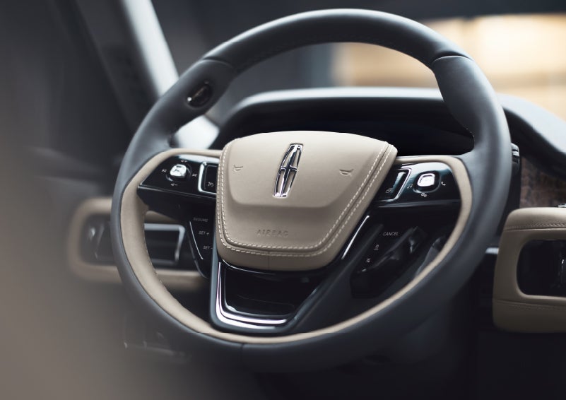 The intuitively placed controls of the steering wheel on a 2024 Lincoln Aviator® SUV | Allan Vigil Lincoln, Inc. in Morrow GA
