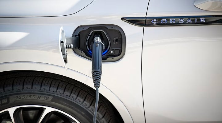 An electric charger is shown plugged into the charging port of a Lincoln Corsair® Grand Touring
model. | Allan Vigil Lincoln, Inc. in Morrow GA